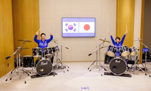 Japan, South Korea Leaders Drum Up Viral Moment With K-Pop Jam