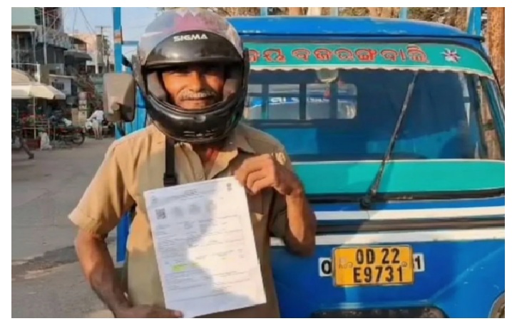 Auto Owner Fined for Helmet in System Error