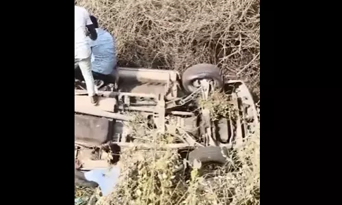 Car Overturns Near Kondagattu, 12 Devotees Injured