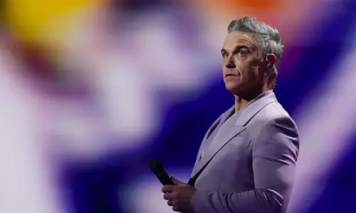 Robbie Williams Tops Beatles for Most Number One Albums in UK