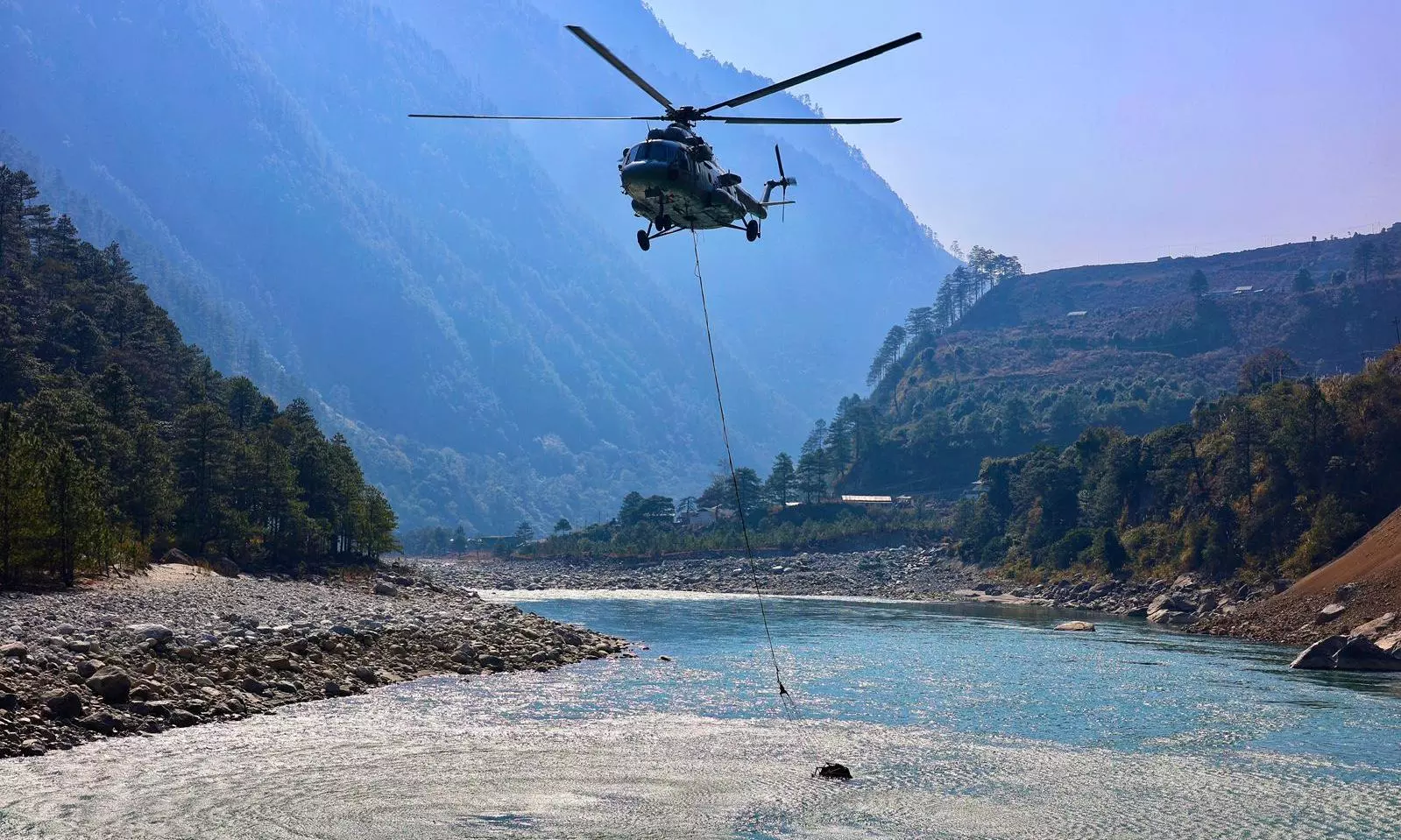 IAF Drops 12,000 Litres of Water To Battle Forest Fires in Arunachal Pradeshs Lohit Valley IAF Drops 12,000 Litres of Water To Battle Forest Fires in Arunachal Pradeshs Lohit Valley