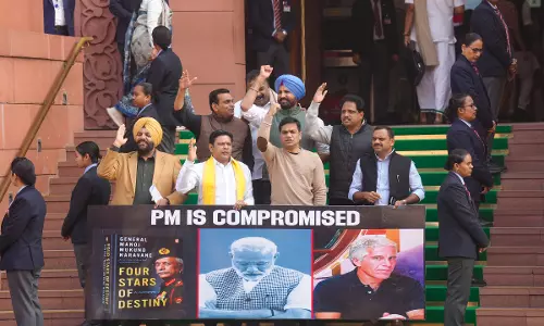 PM is Compromised:  Suspended MPs Protest Outside Parliament