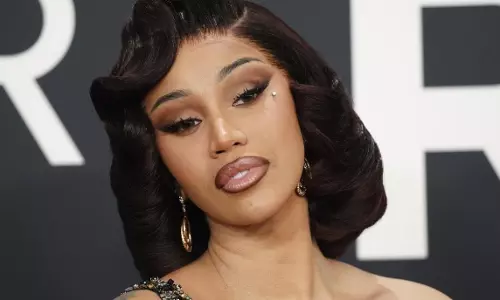 Cardi B Takes Tumble While Playfully Dancing With Robot Ahead Of Super Bowl