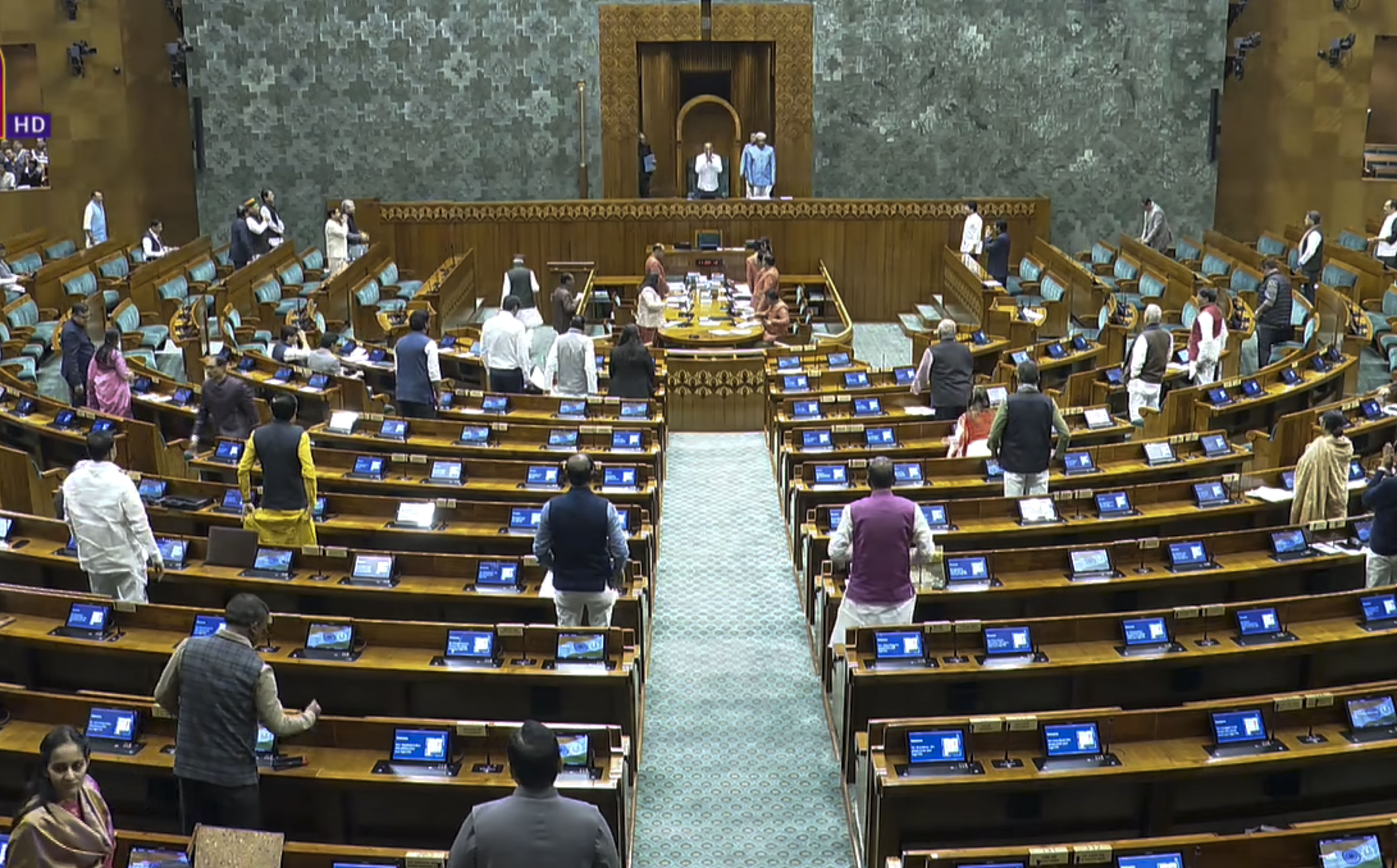 Opposition members shouted slogans as they sought to raise certain questions but P C Mohan, who was in the Chair, did not allow them