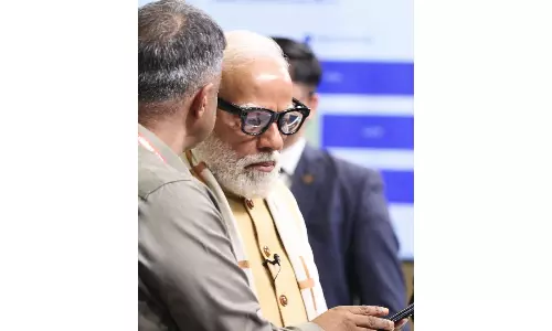 PM Modi Debuts Indigenous AI Smart Glass Sarvam Kaze at Summit