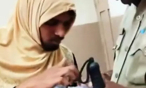 Man Posing as Woman in Burqa To Film Prank Held at Korutla Bus Stand Man Posing as Woman in Burqa To Film Prank Held at Korutla Bus Stand