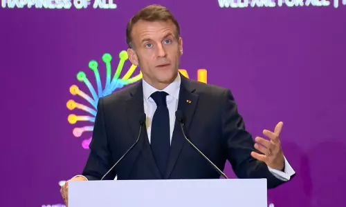 Macron Tells AI Summit Hes Determined to Shape Rules With Allies