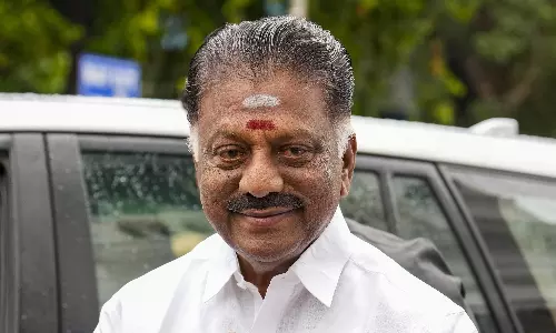 CM Welcomes OPS, Followers Into DMK