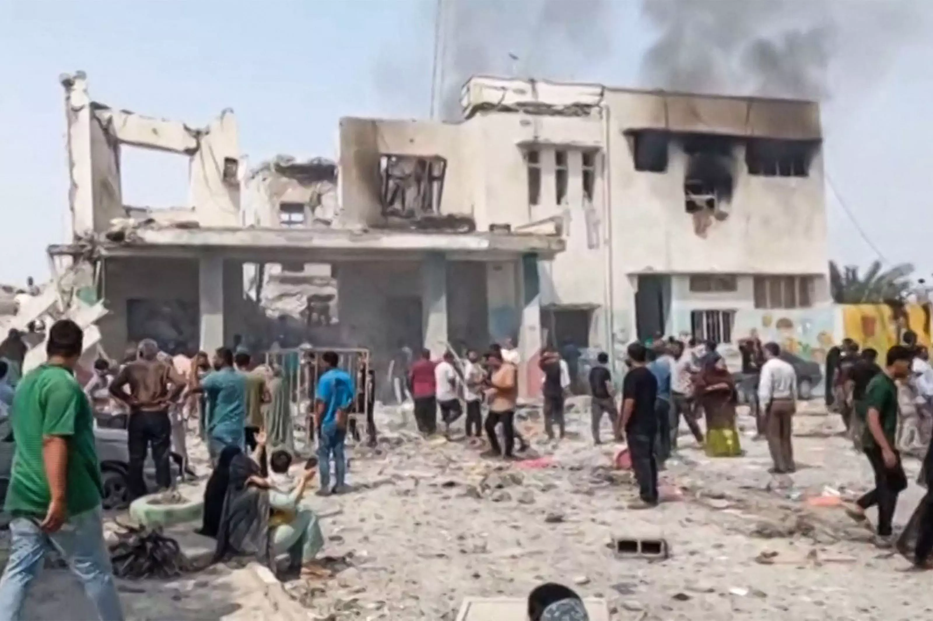 Iran Holds Mass Funeral for People Killed in School Attack Iran Holds Mass Funeral for People Killed in School Attack