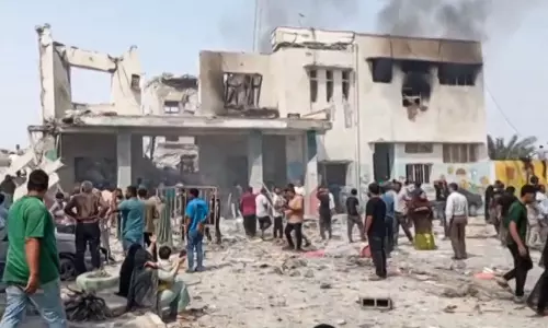 Iran Holds Mass Funeral for People Killed in School Attack Iran Holds Mass Funeral for People Killed in School Attack