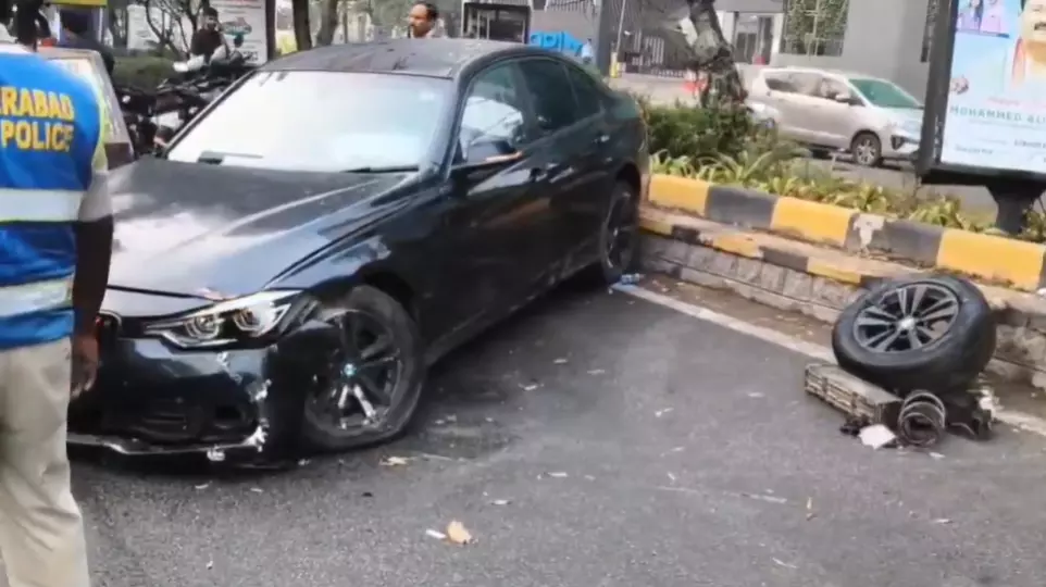 BMW Car Crashes into Divider at Film Nagar BMW Car Crashes into Divider at Film Nagar