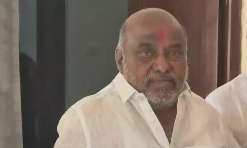 BRS Cadre Stage Dharna Against Delay in Rail Works Under Bridge