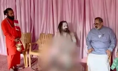 Aghori Babas Entry In BJP Campaign Meeting Fuels Social Media Fireworks In Kerala Aghori Babas Entry In BJP Campaign Meeting Fuels Social Media Fireworks In Kerala