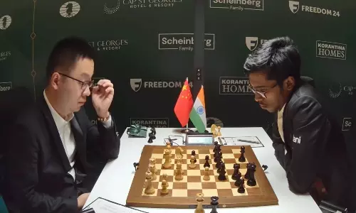 FIDE Candidates: Praggnanandhaa Draws With Wei Yi, Stays in Joint Lead