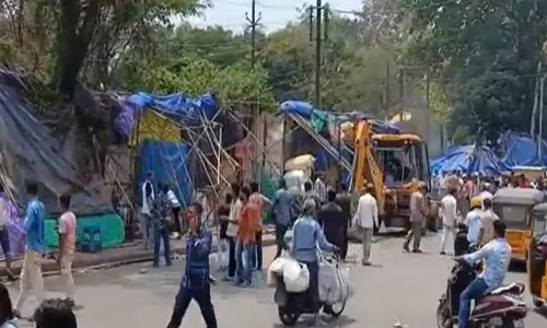 GHMC Clears Footpath Encroachments Near Secunderabad Railway Station GHMC Clears Footpath Encroachments Near Secunderabad Railway Station