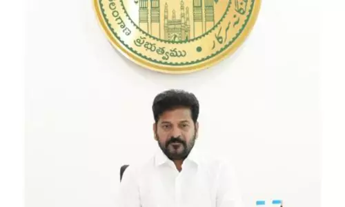 Revanth Dares Vijayan for Debate on Development Revanth Dares Vijayan for Debate on Development