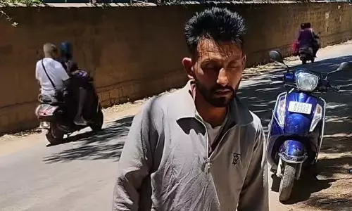 Bengaluru: Youth Caught Standing Motionless In Scorching Sun, Zombie Drug Use Suspected Bengaluru: Youth Caught Standing Motionless In Scorching Sun, Zombie Drug Use Suspected