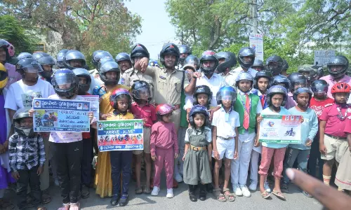 Parents And Children Join Bike Rally To Promote Helmet Use