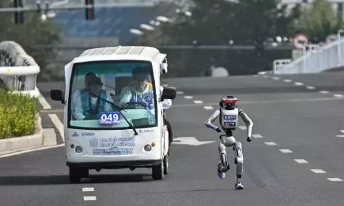 Humanoid Robots Race Past Humans in Beijing Half-Marathon