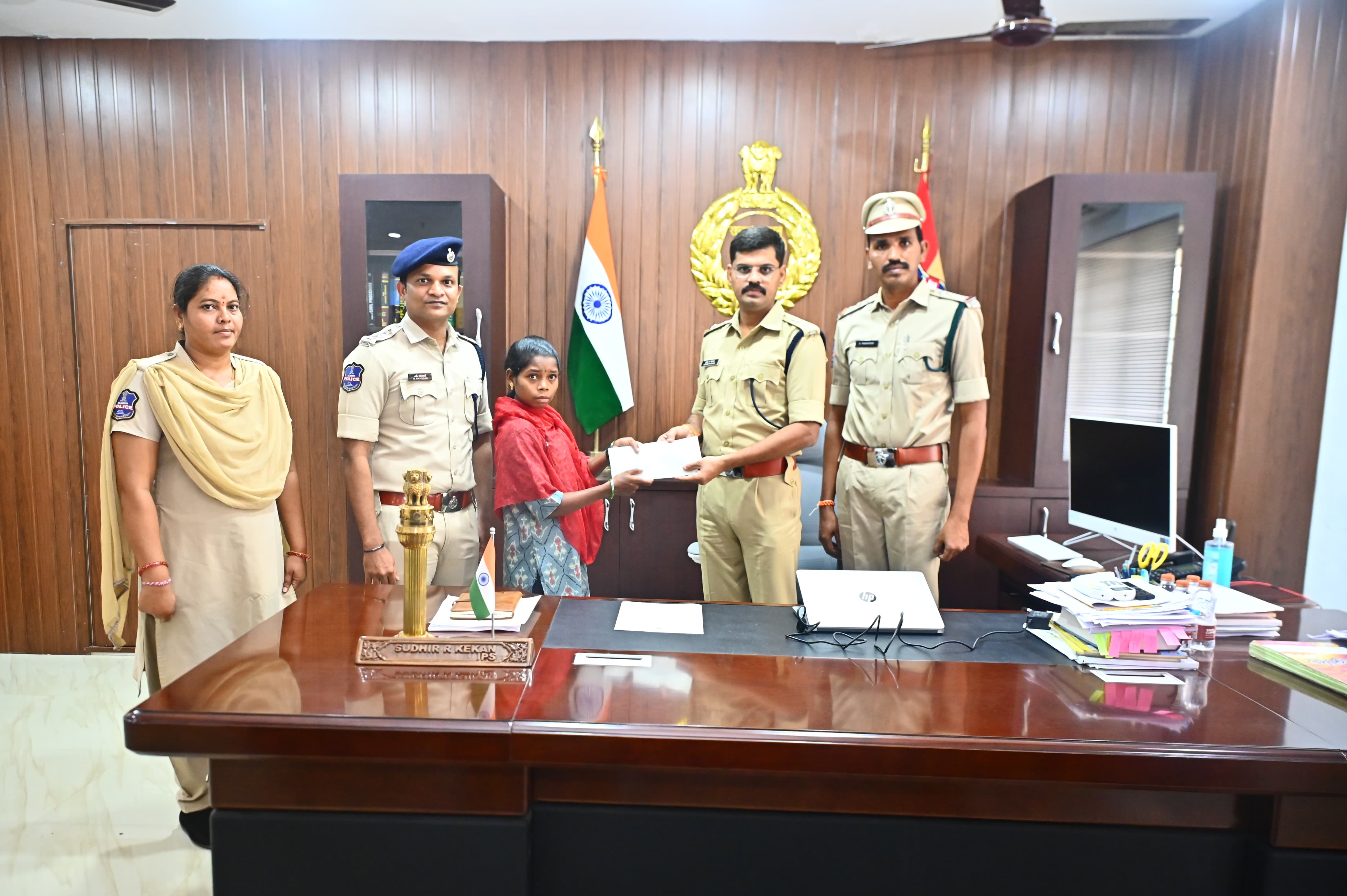 Woman Maoist Party Member Surrenders Before SP in Mulugu