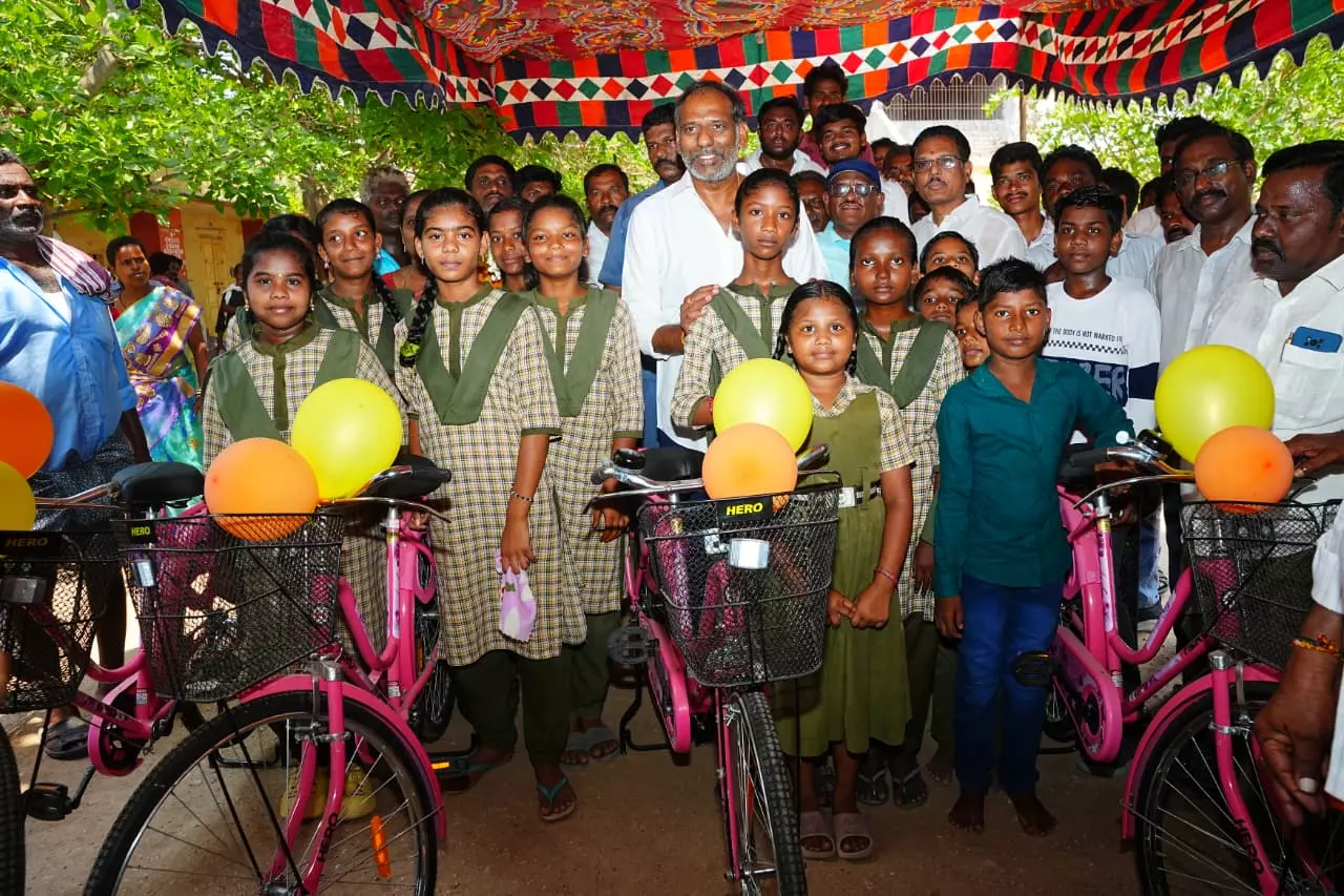 Minister Distributes Bicycles, Lays Temple Foundation, and Inaugurates Solar Project Minister Distributes Bicycles, Lays Temple Foundation, and Inaugurates Solar Project