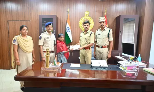 Woman Maoist Party Member Surrenders Before SP in Mulugu Woman Maoist Party Member Surrenders Before SP in Mulugu