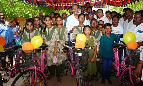 Minister Distributes Bicycles, Lays Temple Foundation, and Inaugurates Solar Project Minister Distributes Bicycles, Lays Temple Foundation, and Inaugurates Solar Project