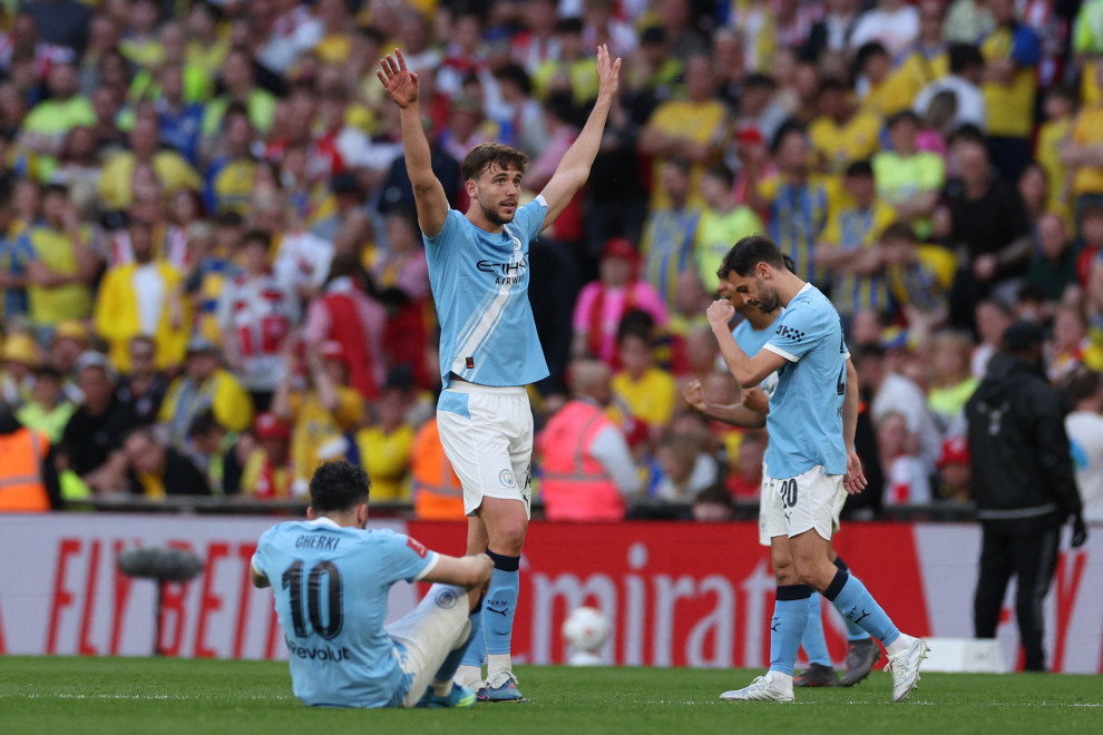Man City into FA Cup Final; Arsenal Tops Premier League