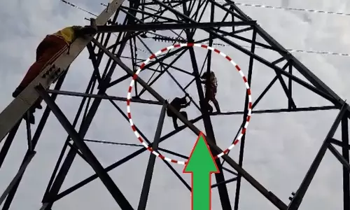 Man Climbs 33 KV Electric Pole In Odisha, Rescued After Tense Operation Man Climbs 33 KV Electric Pole In Odisha, Rescued After Tense Operation
