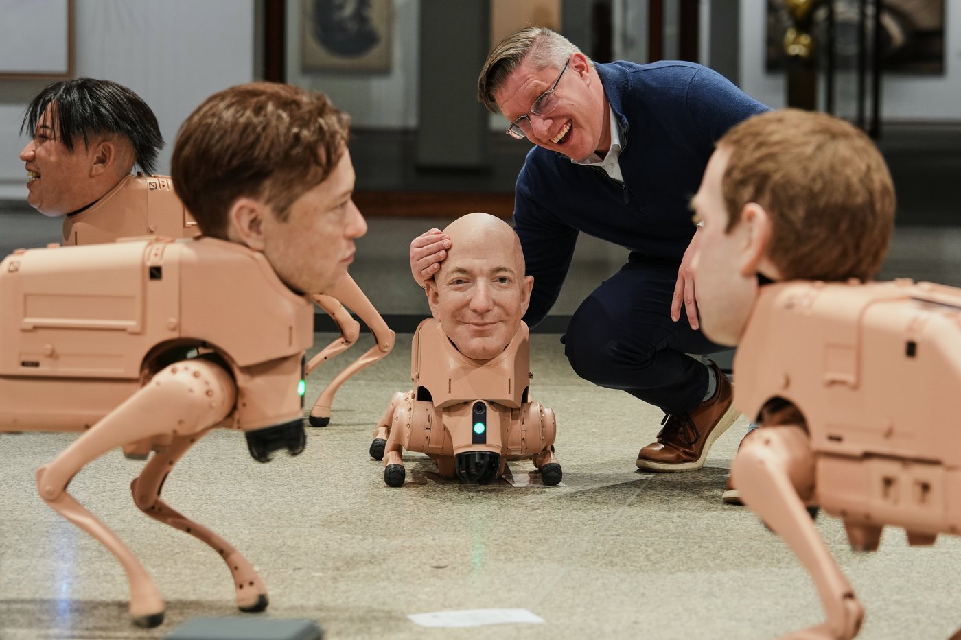 Robot Dogs With Musk And Zuckerberg Heads Roam Around Berlin Museum