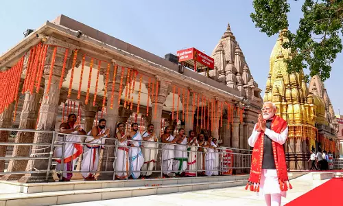 Modi Holds Roadshow in Varanasi, Offers Prayers at Vishwanath Temple Modi Holds Roadshow in Varanasi, Offers Prayers at Vishwanath Temple