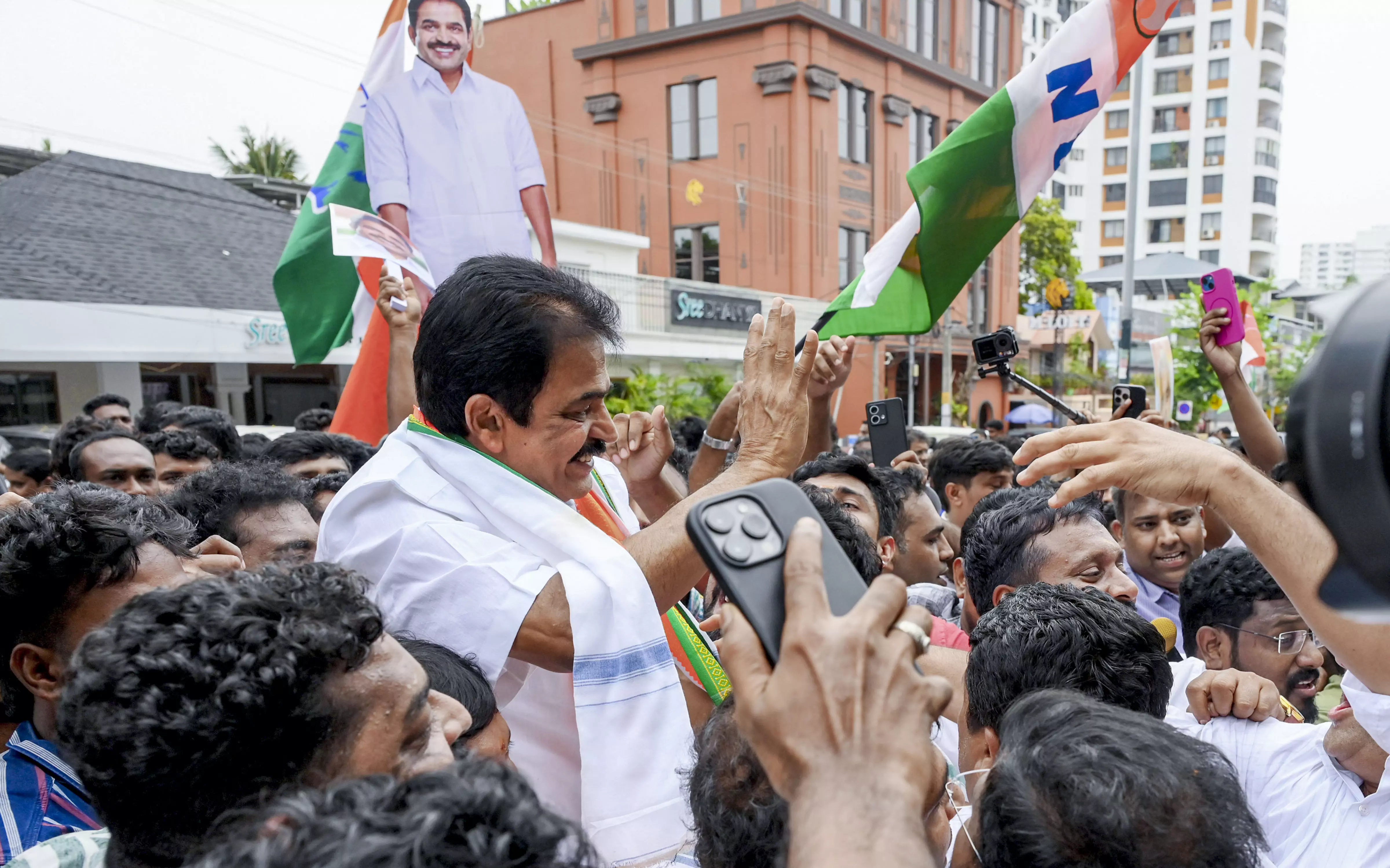 Venugopal Posters up as UDF Sweeps Kerala Polls