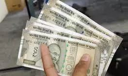 Rupee Gains For 2nd Day As Oil Prices Fall