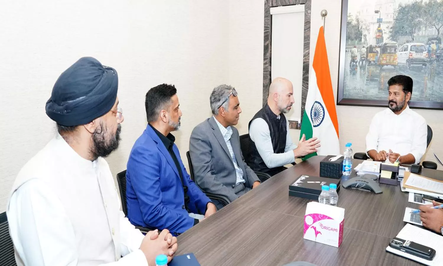 CM Revanth Suggests Uber To Establish Multi-Level Parking Facilities