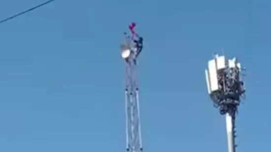 Intoxicated Youth Climbs Cell Tower, Triggers High Drama in Yerragondapalem Intoxicated Youth Climbs Cell Tower, Triggers High Drama in Yerragondapalem