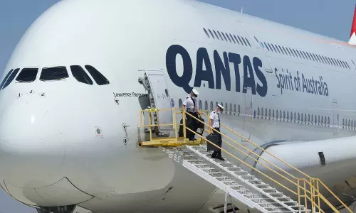 Qantas Bans Passenger for Biting Crew Member