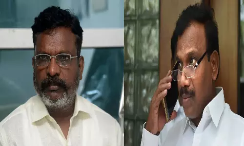 TVK Slams DMKs A Raja Over Bent Coconut Tree Jibe