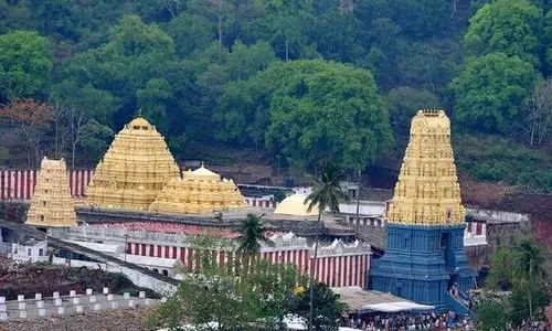 Devotees Brave Heat for Darshan at Simhachalam Devotees Brave Heat for Darshan at Simhachalam