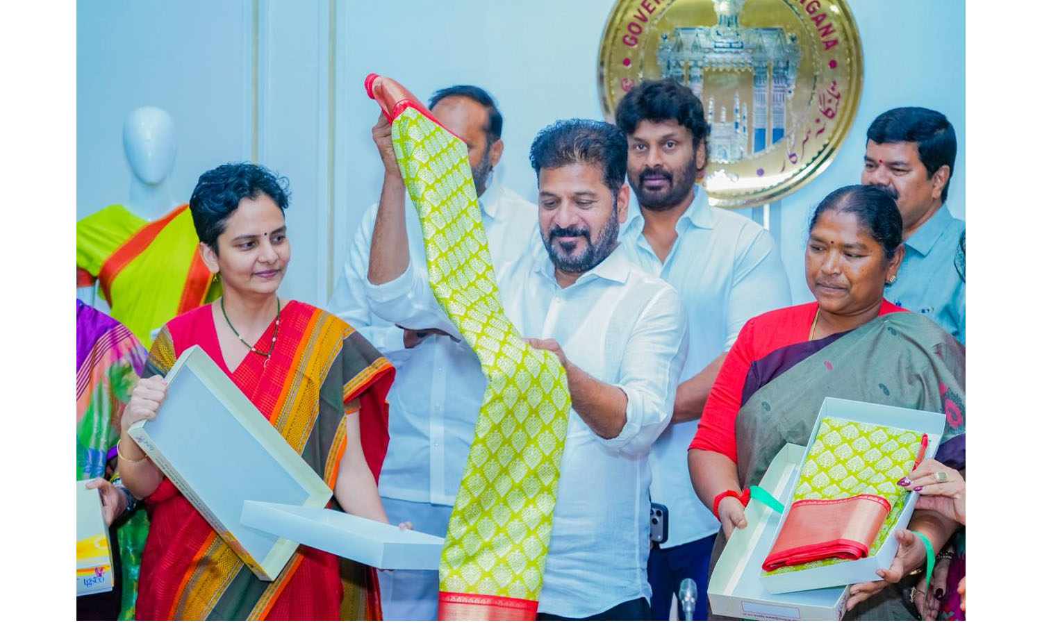 CM Revanth Unveils New Indiramma Saris For Bathukamma This Year