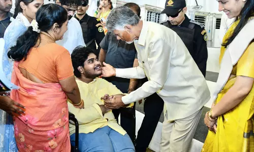 CM Naidu Interacts with Differently-Abled Youth, Reviews Government Stalls in Kakinada