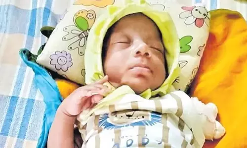 Khammam Couple Alleges Medical Negligence After Newborn Loses Hand