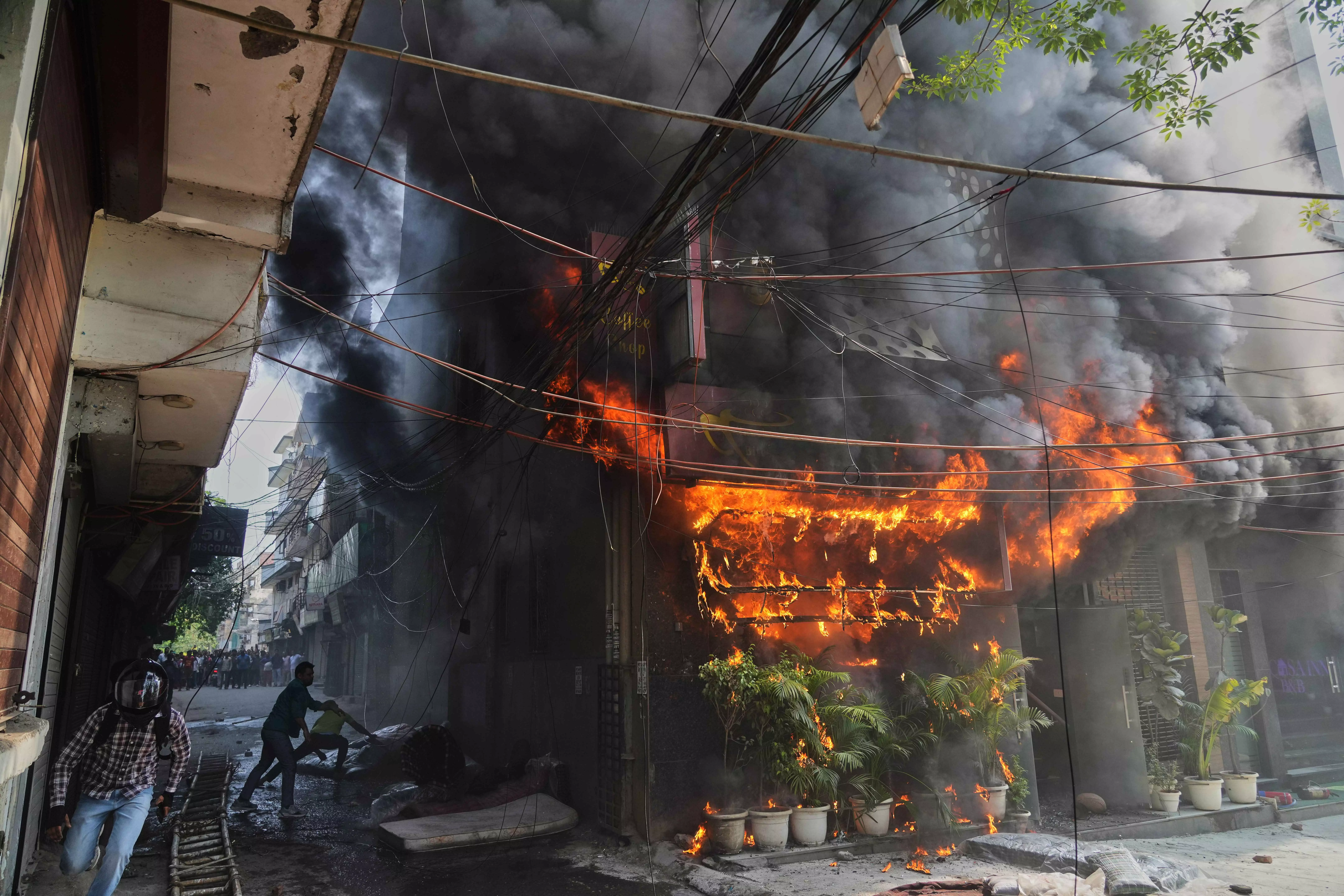 Delhi Blaze: Hotel Building Owner Arrested After Malviya Nagar Fire Kills 21 Delhi Blaze: Hotel Building Owner Arrested After Malviya Nagar Fire Kills 21
