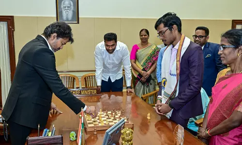 Vijay Plays Chess With Grandmaster Praggnanandhaa After Felicitation Vijay Plays Chess With Grandmaster Praggnanandhaa After Felicitation