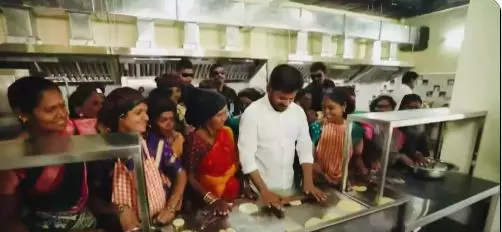 Revanth Reddy Joins School Kitchen Staff, Prepares Chapatis at TPS Revanth Reddy Joins School Kitchen Staff, Prepares Chapatis at TPS