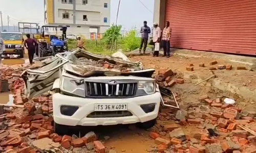 Two Killed After Wall Collapses on Car in Mahabubnagar Two Killed After Wall Collapses on Car in Mahabubnagar