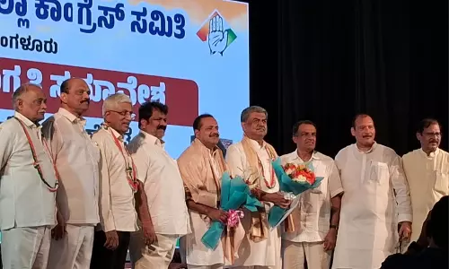 Karnataka: A Cheque, A Quip And A Light Moment At Congress Event