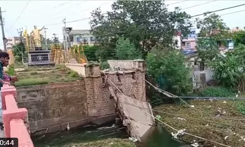 94-year-old Penamaluru Bridge Partially Collapses, No Casualties 94-year-old Penamaluru Bridge Partially Collapses, No Casualties