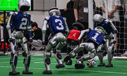 Move Over, Messi! Robot Footballers Thrill Crowds in South Korea Move Over, Messi! Robot Footballers Thrill Crowds in South Korea