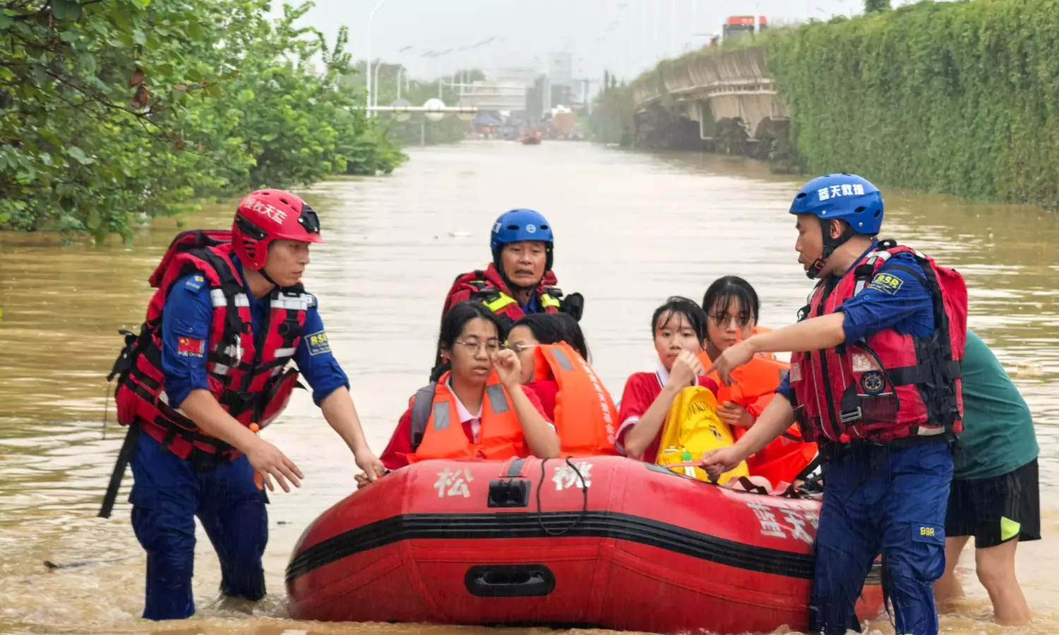 Rescuers Hunt for Missing as China Storms Force 100,000 to Flee Rescuers Hunt for Missing as China Storms Force 100,000 to Flee