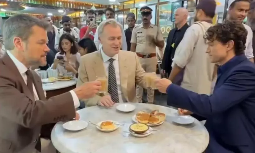 Christopher Nolan, Tom Holland, Matt Damon Enjoy Tea, Bun Maska At Mumbais Olympia Coffee House Christopher Nolan, Tom Holland, Matt Damon Enjoy Tea, Bun Maska At Mumbais Olympia Coffee House